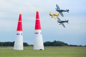 Uk pilots Paul Bonhomme, Steve Jones and Nigel Lamb fly a Spitfire, in front of the Red Bull Air Race in Ascot in August, 2014