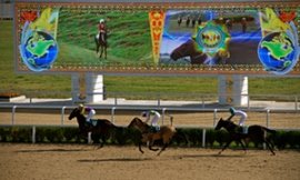 Riders warm-up their horses during the 0m Ashgabat hippodrome during a Sunday mid-day of events.